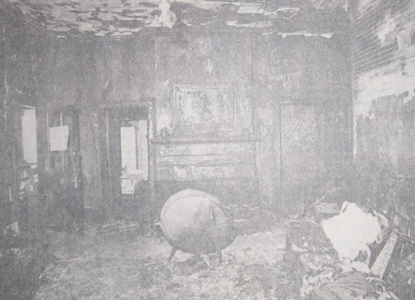 Scorched walls and fire-ravaged furniture are all that remain of a first-floor living room at 15-17 Stanley St. after an early Sunday morning fire in which one man died and five other were injured. A London teenager, who lived at the rooming house, has been charged with arson and murder in connection with the blaze.