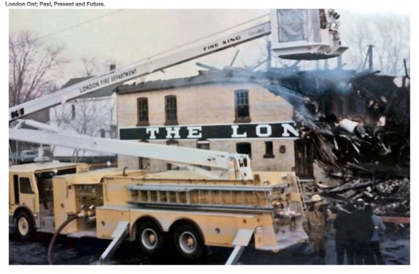 London Aerial platform truck setup with the burned remains of the London Soap Company in the background