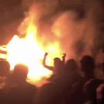 riot-2 Students danced in front of burning furniture, garbage and fencing ripped from neighbour yards.