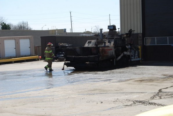  A fire that engulfed a road paver outside an east London business caused $30,000 damage Saturday. DALE CARRUTHERS / THE LONDON FREE PRESS / QMI AGENCY 