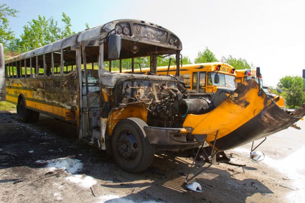 Early Monday May 20, 2013 morning a school bus and truck were torched at the RONA parking lot at Beaverbrook and Wonderland Road. Police say the two vehicles were valued at $250,000 in total, with the bus being about $150,000 and the truck $100,000. Police found the remains of a commercially bought civilian firework underneath the engine of the school bus, as well as one perched on the roof of a less damaged bus nearby. London, Ont MIKE HENSEN/The London Free Press/QMI AGENCY 