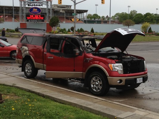 Burnt out red pick up truck fire on Florence street