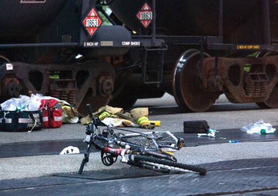 Two people were struck by a train at Colborne St. and York St. in London, Ontario on Wednesday, July 3, 2013. Both were taken to hospital with life threatening injuries. (DEREK RUTTAN, The London Free Press)