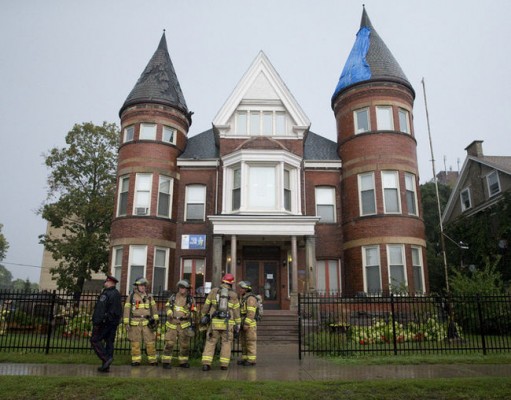  Firefighters look for signs of smoke at My Sister's Place after the London women's shelter was struck by lightning for the third time in about six weeks on Friday. CRAIG GLOVER The London Free Press / QMI AGENCY