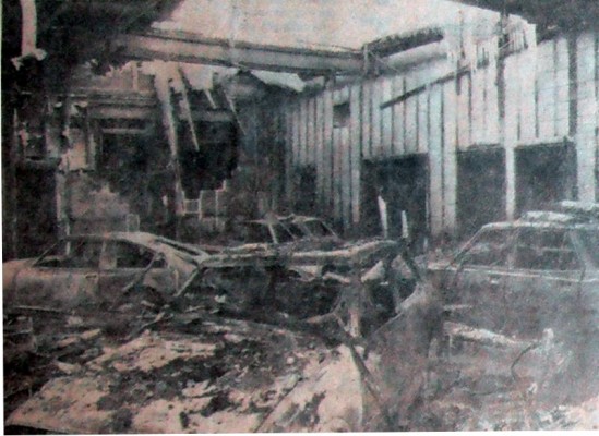 Only the walls, scattered debris and the hulks of a few cars remain of the showroom following a fire late Wednesday at Competition Motors (London), Ltd., 1206 Oxford St. E. Damage was estimated at $250,000. The fire also destroyed cars parked near the building. Armored personnel carriers from CFB London were dispatched to assist firemen. (Sam McLeod - The London Free Press)