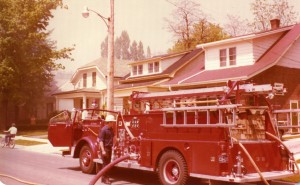 Unit 13 working a garage fire on Emery Street in the mid-seventies.