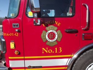 Driver door with LFD logo and Engine 13