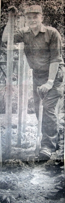 Platoon Chief Fred Holmes standing in his garden.