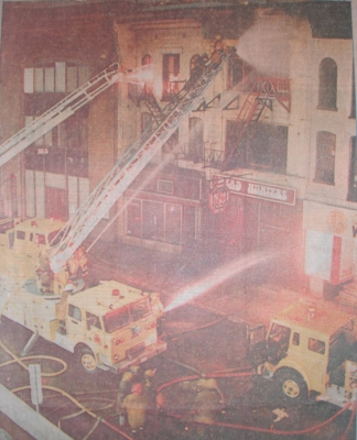 Master streams pour water to downtown buildings