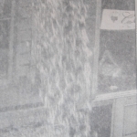 Water gushed from a second-storey window