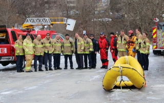 London Fire Fighters after ice water training posing for a group photo