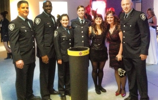 Fire fighters pose while attending the My Sister's Place fundraising event.