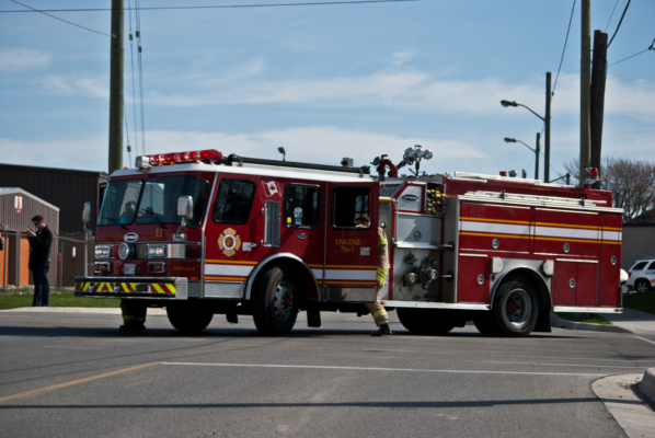 Firefighters entering Engine one disembarking a scene