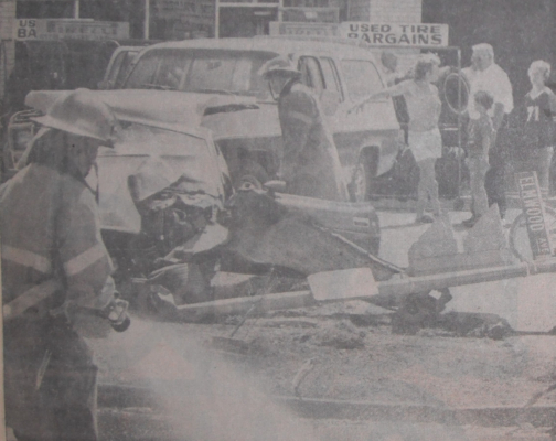 London Fire fighters survey the aftermath of a motor vehicle collision