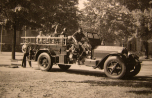 1955 London Fire truck and men doing training