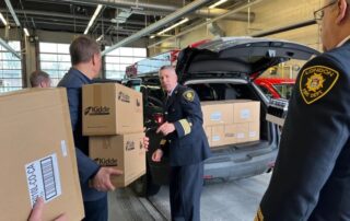 A fresh batch of combination smoke and carbon monoxide are loaded into a vehicle for the Project Home housing stability in London, Ont.