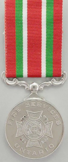 The Ontario medal for firefighting bravery. It is silver in colour hung with a striped ribbin of red, green & white.