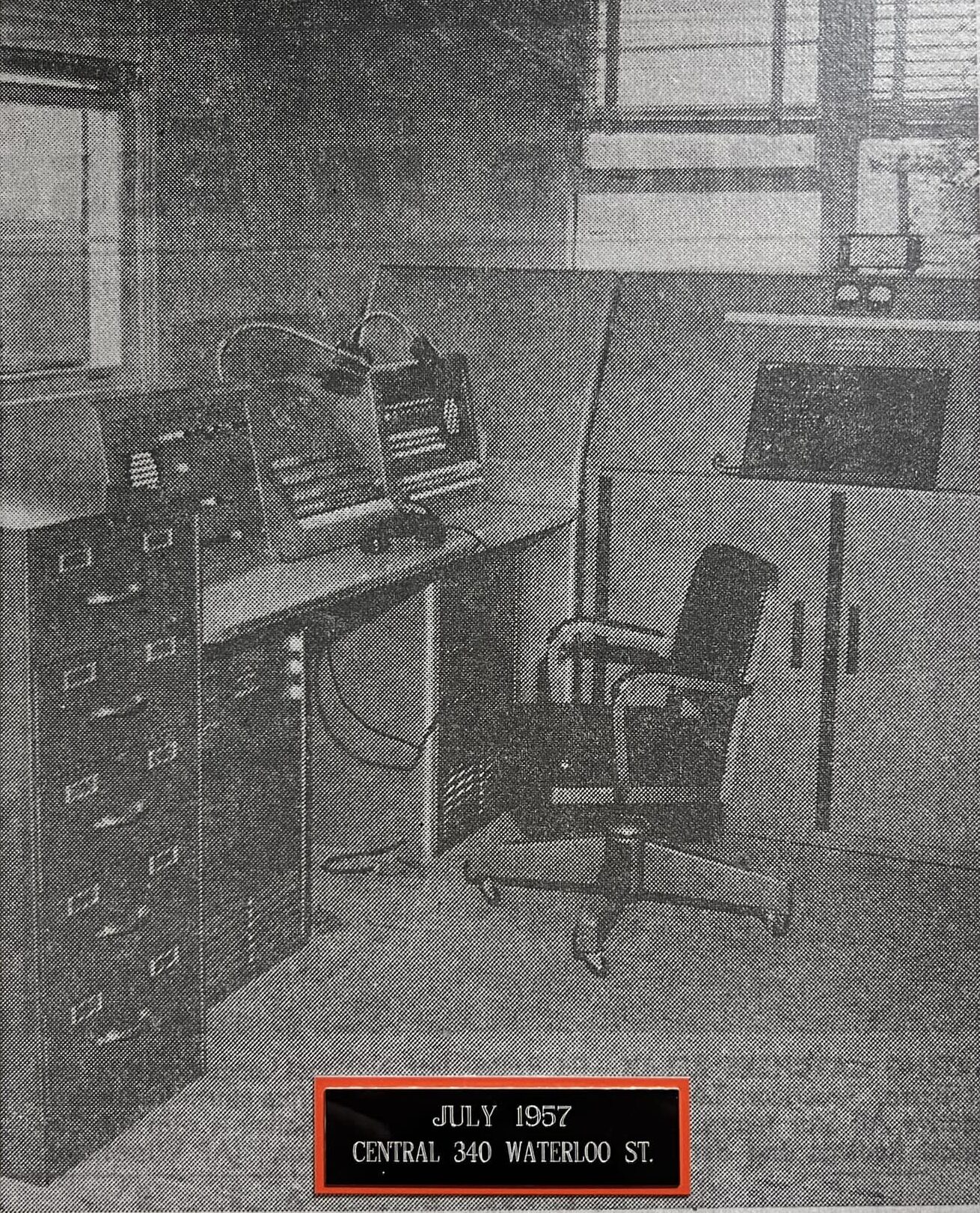 The new dispatcher’s office contains the very latest in electronics and telephonic communications sets. The dispatcher can speak to all parts of the building by public address system, cal all other stations, workshop and radio equipped vehicles by either telephone or radio or both, and control all street sirens. (Source: Jim Fitzgerald)