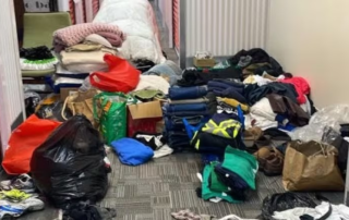 Clothing and other items donated to help tenants displaced by a fire last week that destroyed 33 Becher St. in London, Ont. Matt Smith, owner of Wortley Auto Service, says enough was donated to fill a 10x10 storage unit, and most of a 20-foot-long shipping container. (Matt Smith)