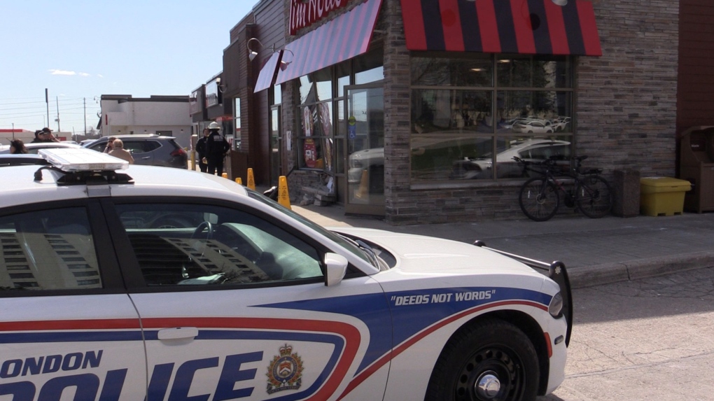 First responders were called to 670 Wonderland Rd. N. in London, Ont. after a vehicle struck the front of a building on March 24, 2024. (Brent Lale/CTV News London)