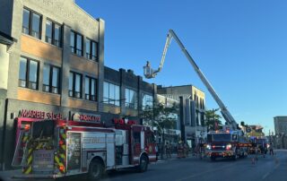 Truck 1 set-up accessing the roof of a Richmond St business