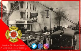 recall it was a very cold day about -20 F. The hydrant in front of the building was covered with ice as was Firefighter Don Whitworth from a leaking hydrant. Engine 1 (pictured) was pumping from this hydrant. I was glad the pump operating panel was on the opposite side of the truck. Also in this picture is Truck 1 aerial at the side of the building and Truck 2 aerial at the front of the building. The Rescue unit is at the front and the Platoon Chief Stuart Smith and Engine 1 at the front.