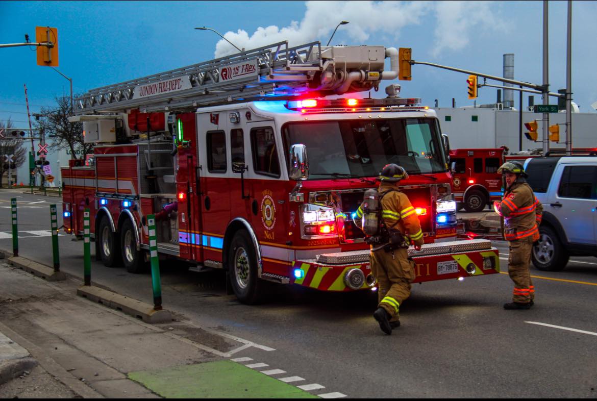 Two London fire fighters working at the front end of Truck 1