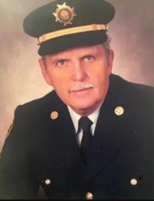 Portrait photograph of George Edmunds as featured in his obituary, showing a composed head-and-shoulders image used for memorial tribute.